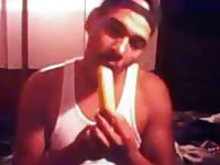 Guy gagging on his banana