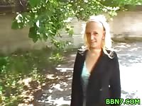 Hot blonde sucking a cock in public for cash